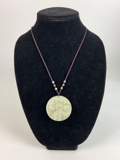 Carved Jade Pendant Necklace With Cord - Image 1