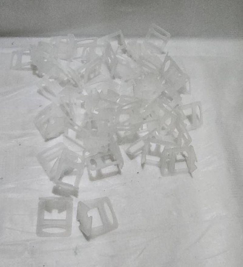 White Plastic Clip-On Fasteners - Image 1