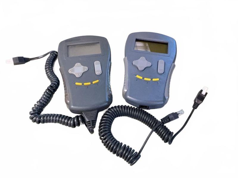 Two Handheld Electronic Controller Units - Image 1