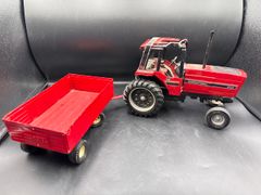 ERTL International 5088 Diecast Tractor With Farm Trailer - Image 1
