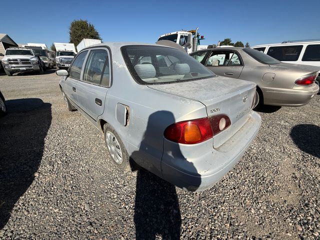 2001 TOYOTA Corolla photo 2 of 13