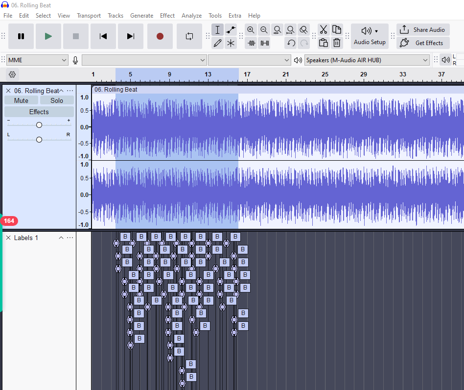 Screenshot of Audacity showing a stereo waveform with multiple labeled beat markers placed by the Beat Finder tool.