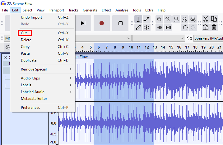 Audacity Edit menu open with the "Cut" option highlighted, demonstrating how to remove the selected audio clip.