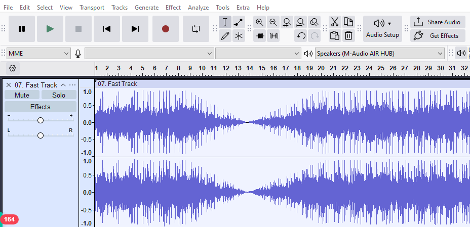 Audacity interface showing a stereo audio waveform with symmetrical fade-in and fade-out applied to both channels.