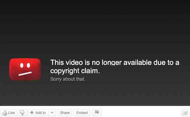 YouTube message: "This video is no longer available due to a copyright claim" with a sad face icon