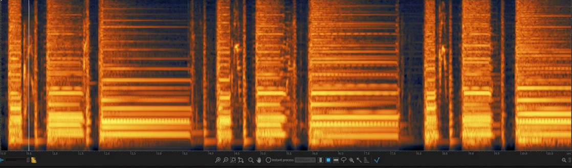 Spectral view in iZotope RX highlighting broadband hiss between 5 kHz and 15 kHz