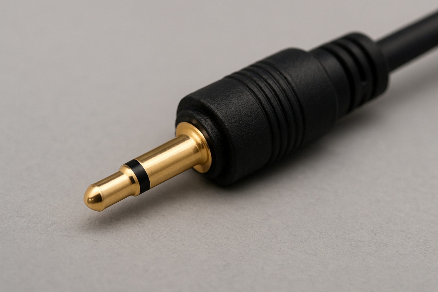 Close-up of a 2.5 mm audio jack used in compact devices and legacy headsets