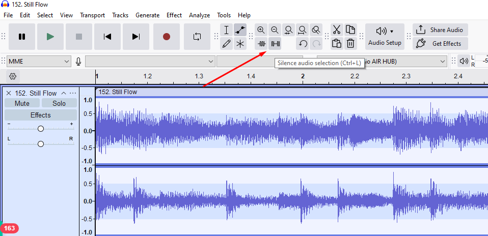 Audacity timeline with a red arrow pointing to the “Silence Audio Selection” button.