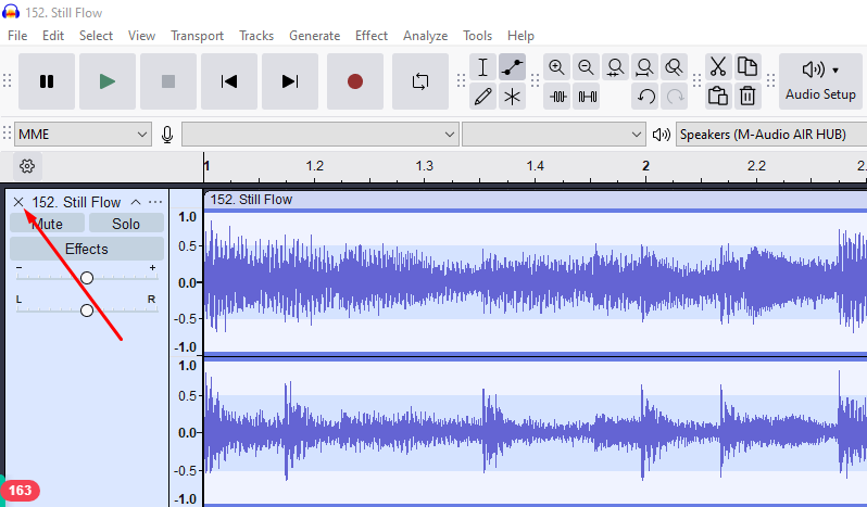 Audacity track panel with a red arrow pointing to the X button used to delete a selected track.