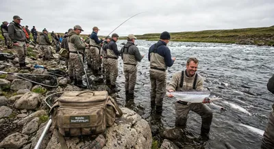 Sharing a Crowded River Run While Fishing for Salmon