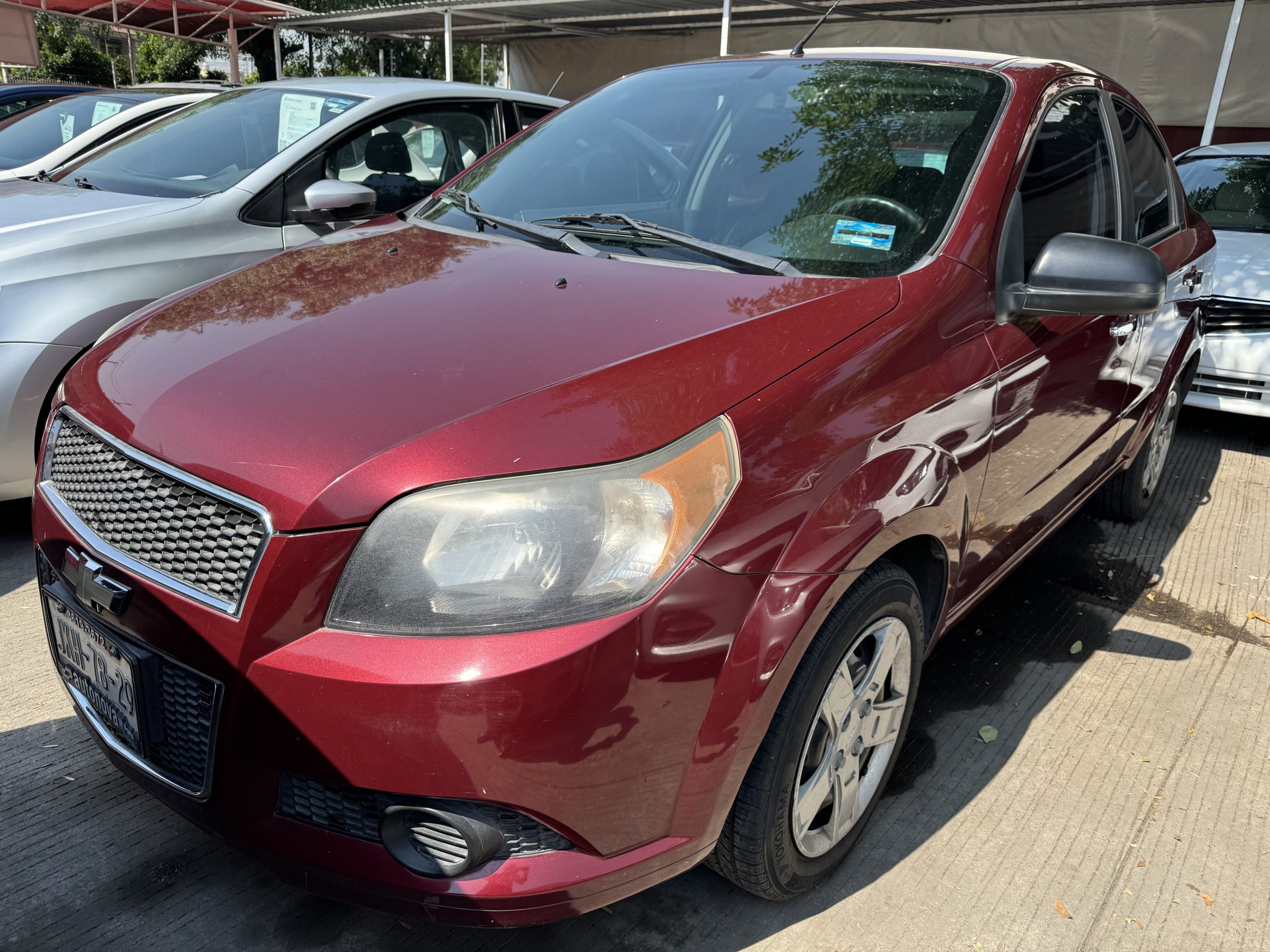 Chevrolet Aveo 2013 Ls Automático Rojo