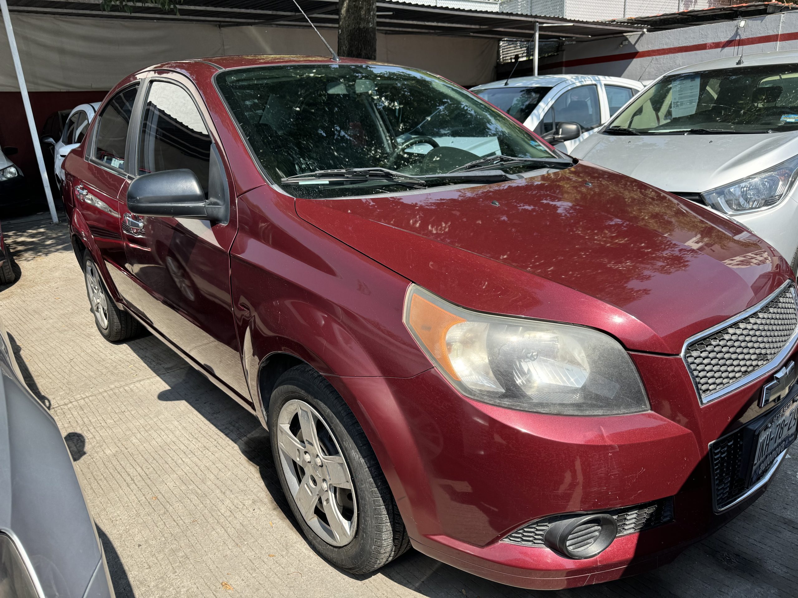 Chevrolet Aveo 2013 Ls Automático Rojo