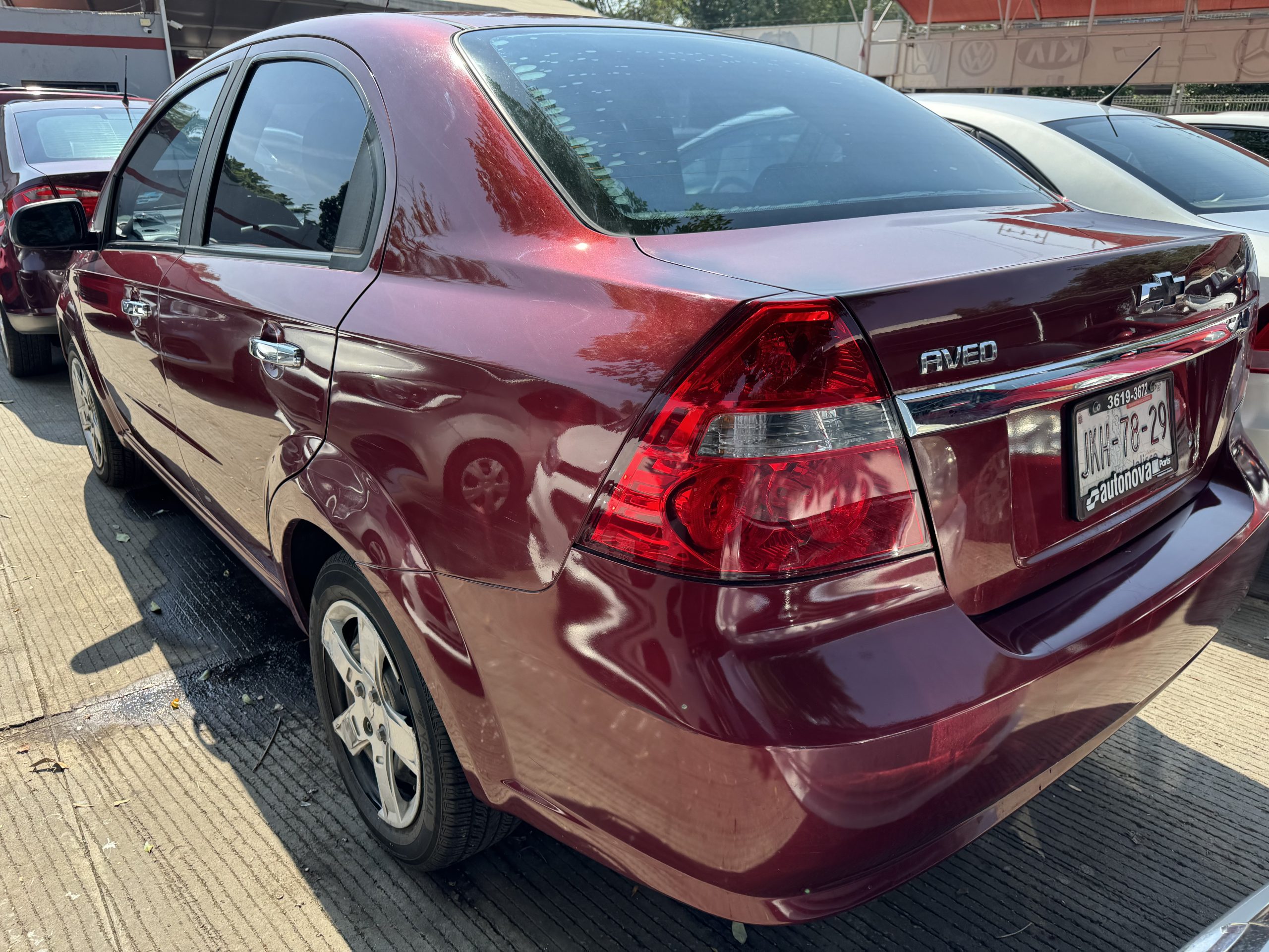 Chevrolet Aveo 2013 Ls Automático Rojo