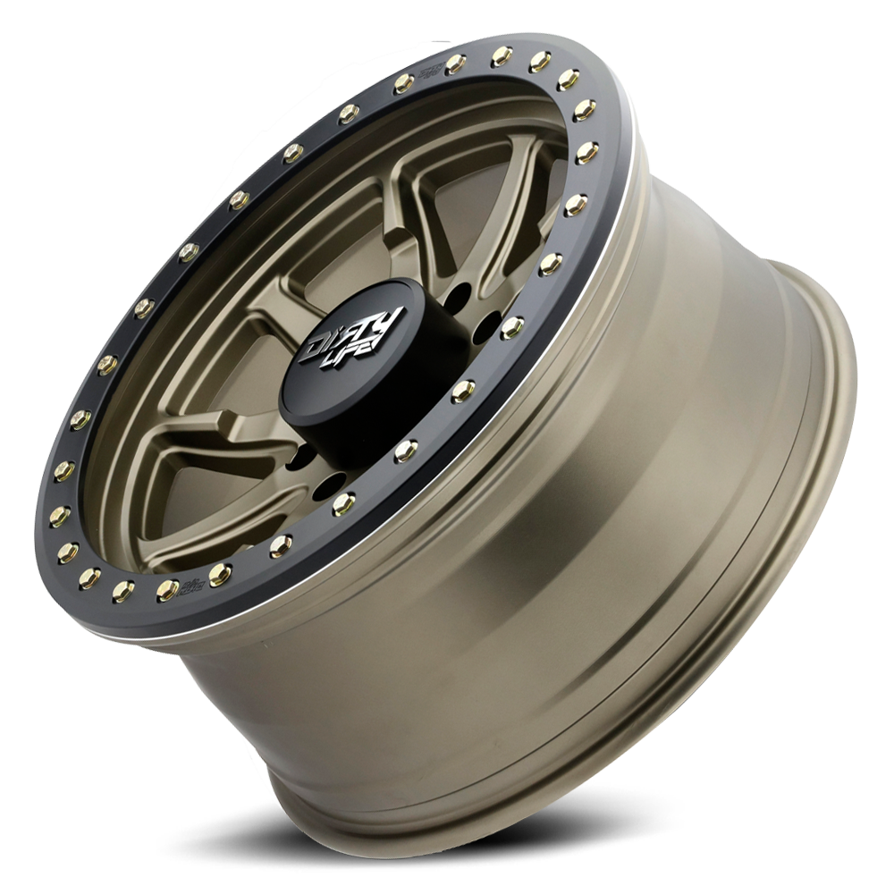 https://storage.googleapis.com/autosync-wheels/Dirty_Life_Race_Wheels/DT-2_9304_Satin_Gold_Simulated-Beadlock-Ring_5-lug_0002.png