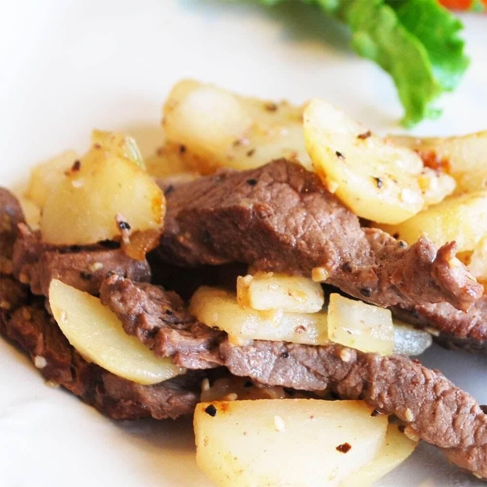 Bistec a la mexicana con papas cambray