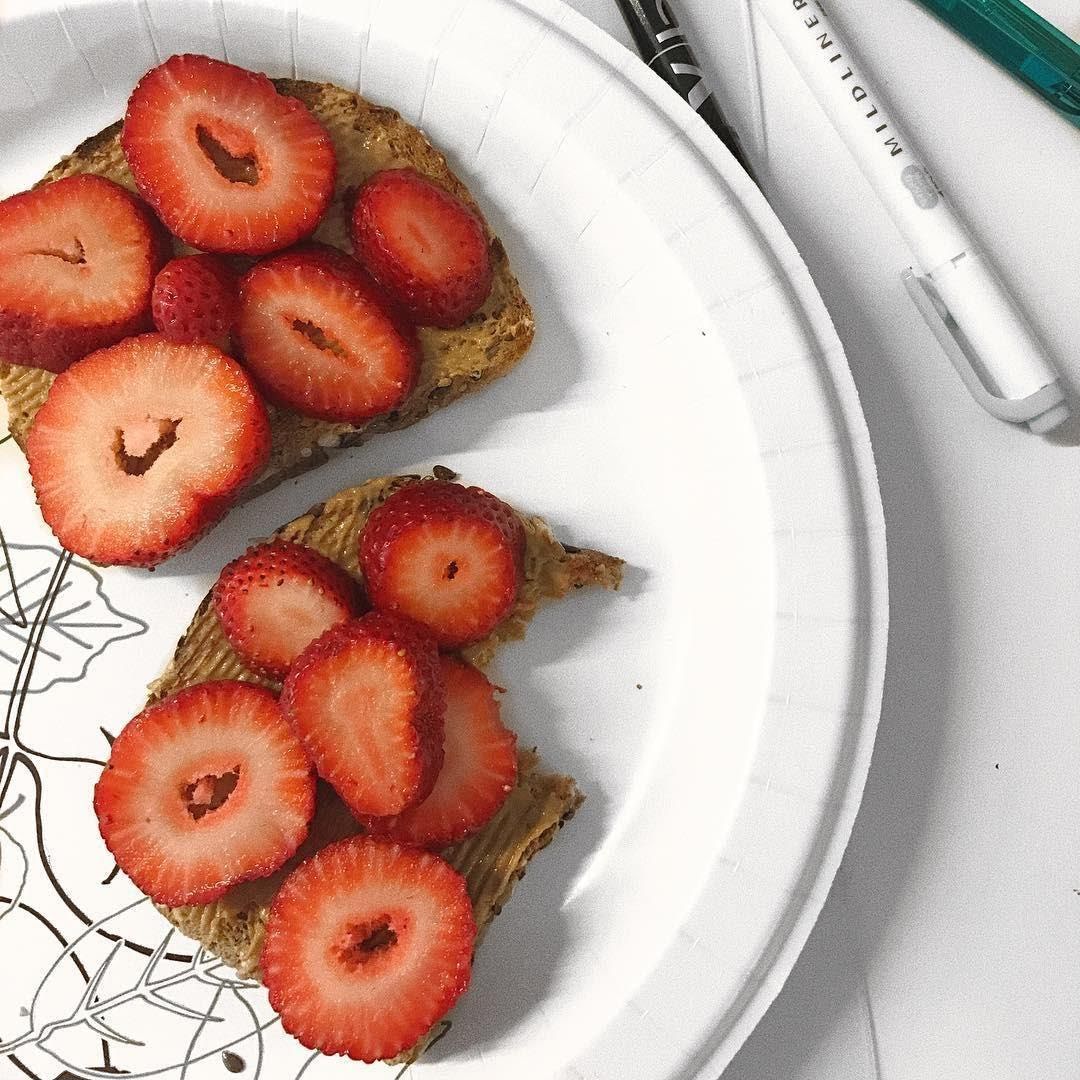 Toast with almond cream and chopped strawberries