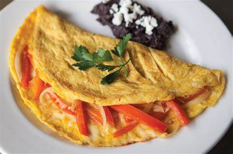 Omelette relleno con pimientos y queso de cabra