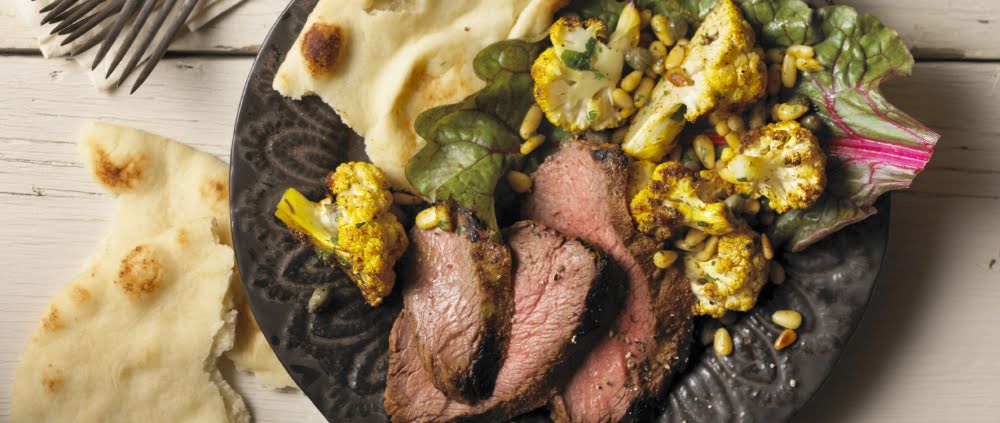 Coliflor asada con especias, carne de res y tortilla de 175 Kcal