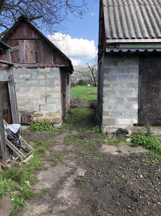 продам частину будинку в місті Лозова