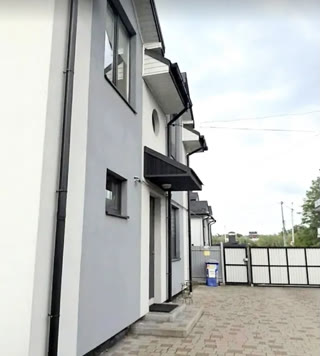 Продаж сучасного 2-поверхового будинку з гаражем в Рудно