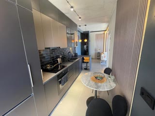 იყიდება პრემიუმ კლასის კომოლექსში Hilton Hampton ხედით ზღვაზე 2 ოთახიანი სტუდიო ბინა
