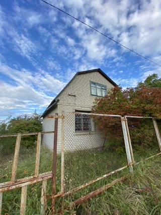 For sale: land with a house