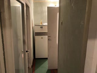 For sale two-room apartment in living condition in the center of the village of Budy