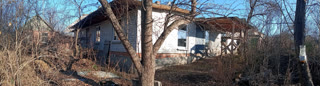 For sale: land with a house