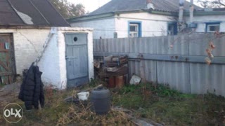 Продам земельну ділянку з будинком в Куп'янському