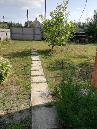 Домовладение на въезде в дергачи