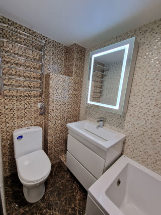 For Sale: Two-Level Apartment in the Center