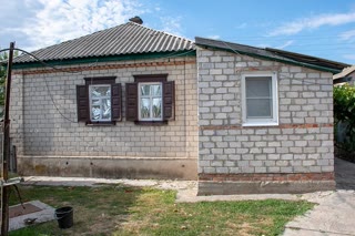 House in Balakliia by the river
