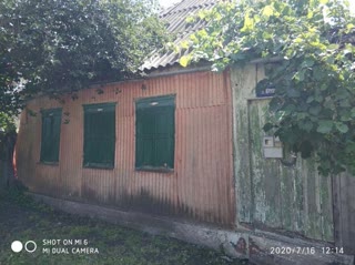 Wooden old house in Chuhuiv on Medova St 26