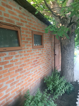 Продам 1/2 дома в Мерефе