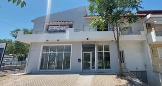 Κτίριο επαγγελματικών χώρων 214τ.μ.
