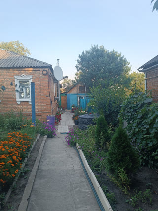 Продам 1/2 дома в Мерефе