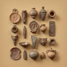 Fragment of a Mayan limestone stela with glyphs.