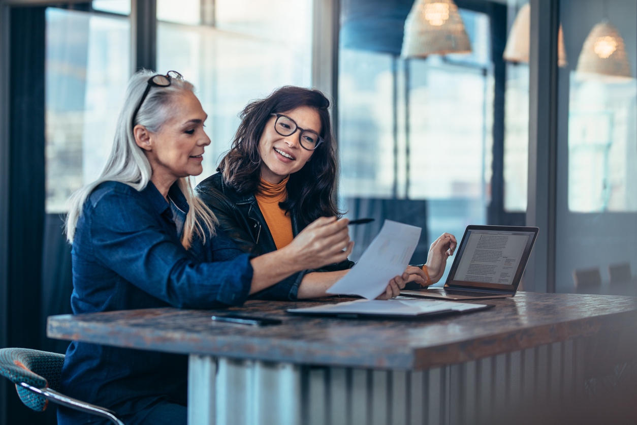 Two women consider ways to save money by working from home