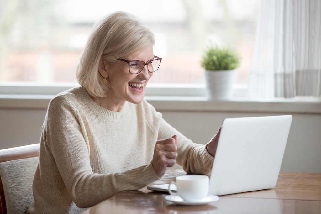 Elderly woman working as part of an age diverse workforce