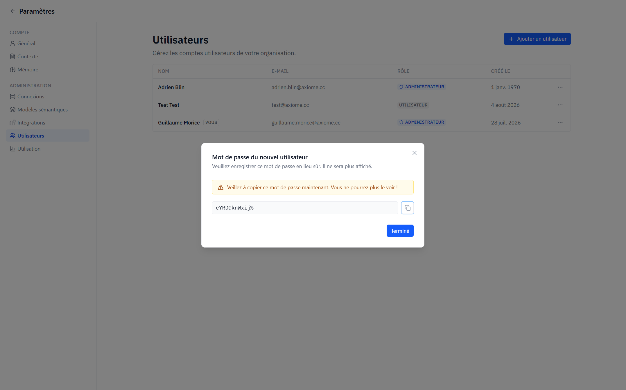 The one-time password dialog shown after creating a user, with its copy button and the warning that it will not be shown again.