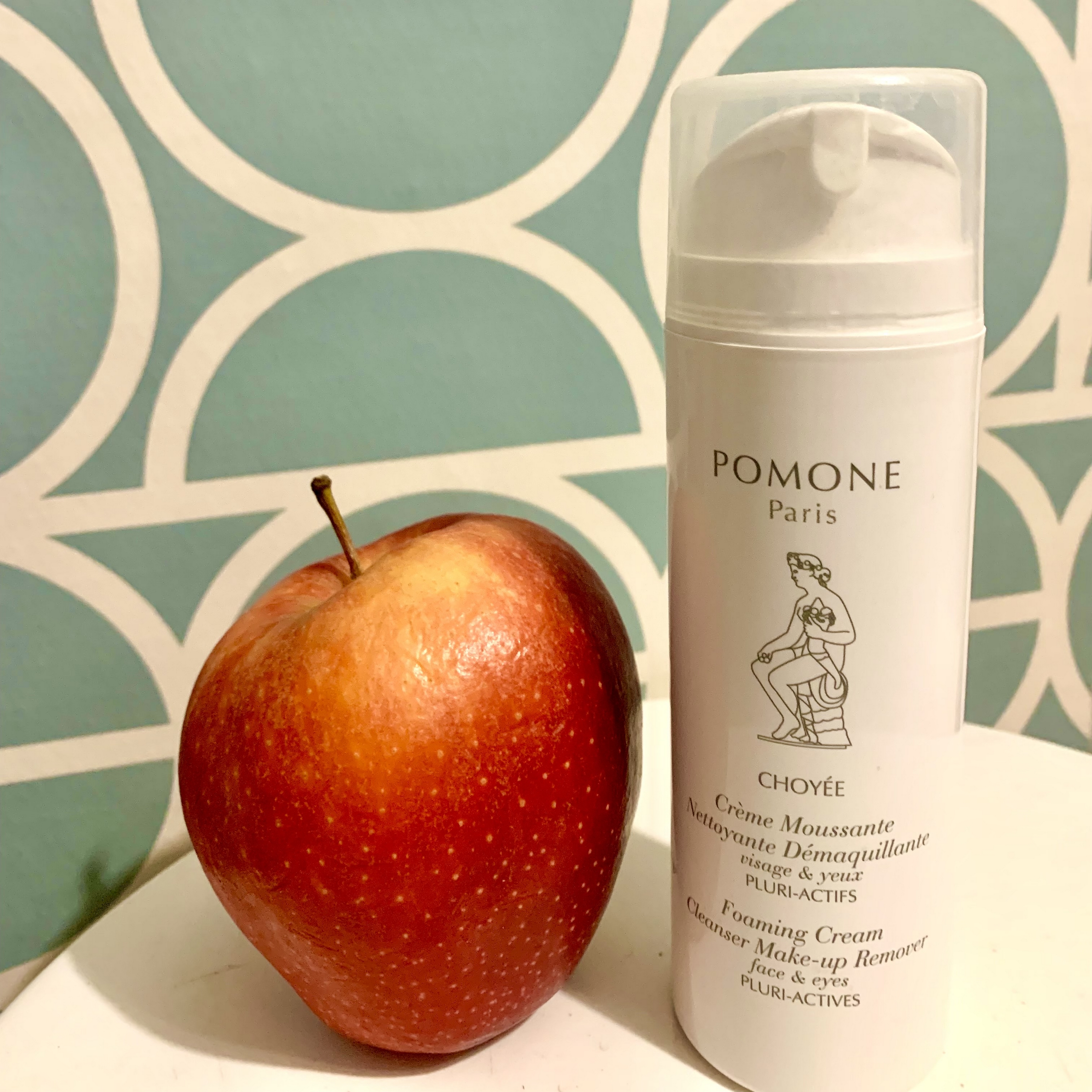 CLEANSER MAKE-UP REMOVER with a red apple