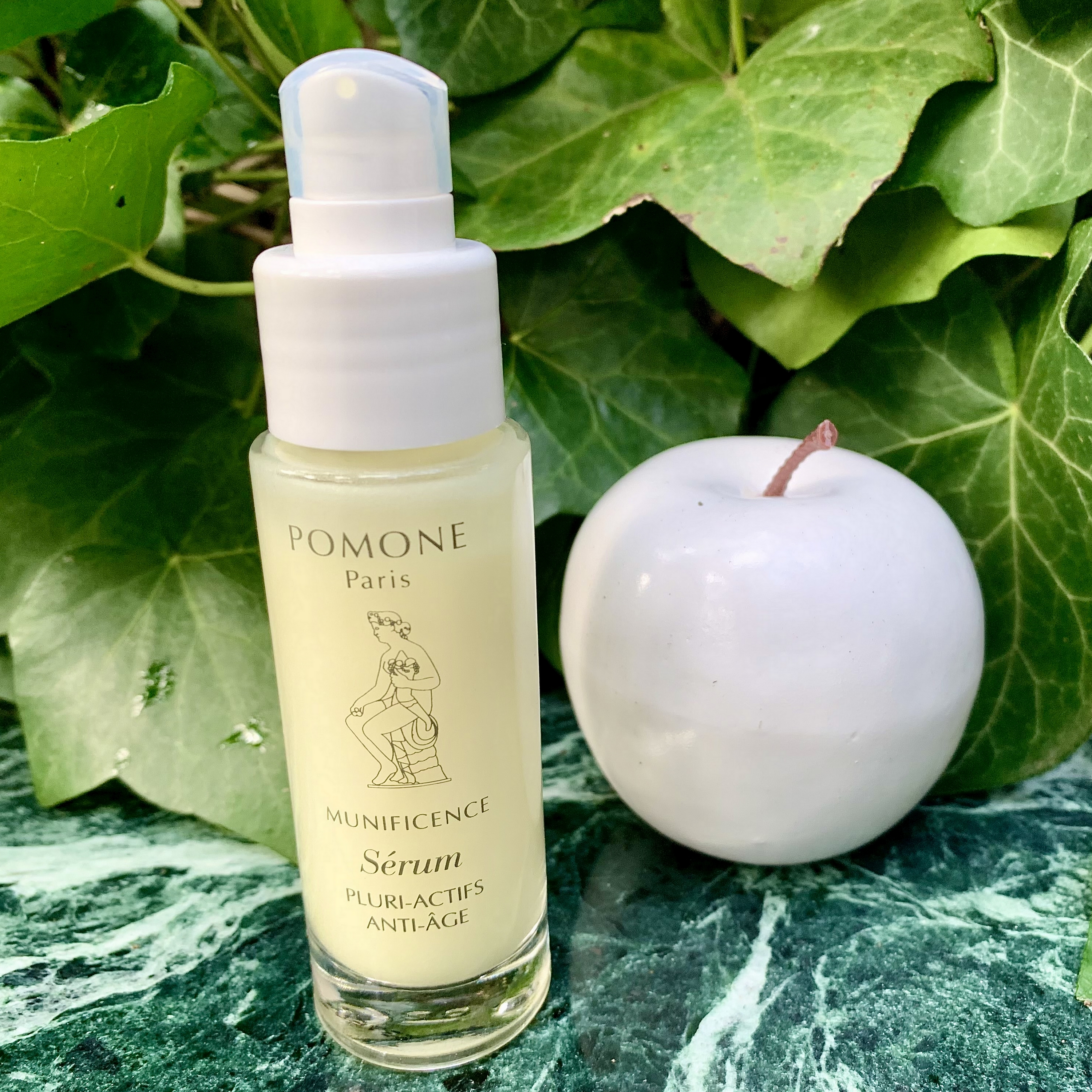 SERUM with a white apple