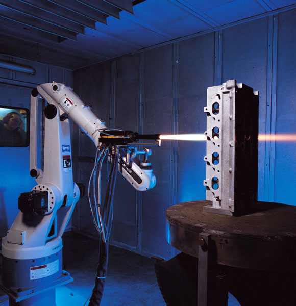 Robot mounted HVOF spraying of an automotive cylinder head