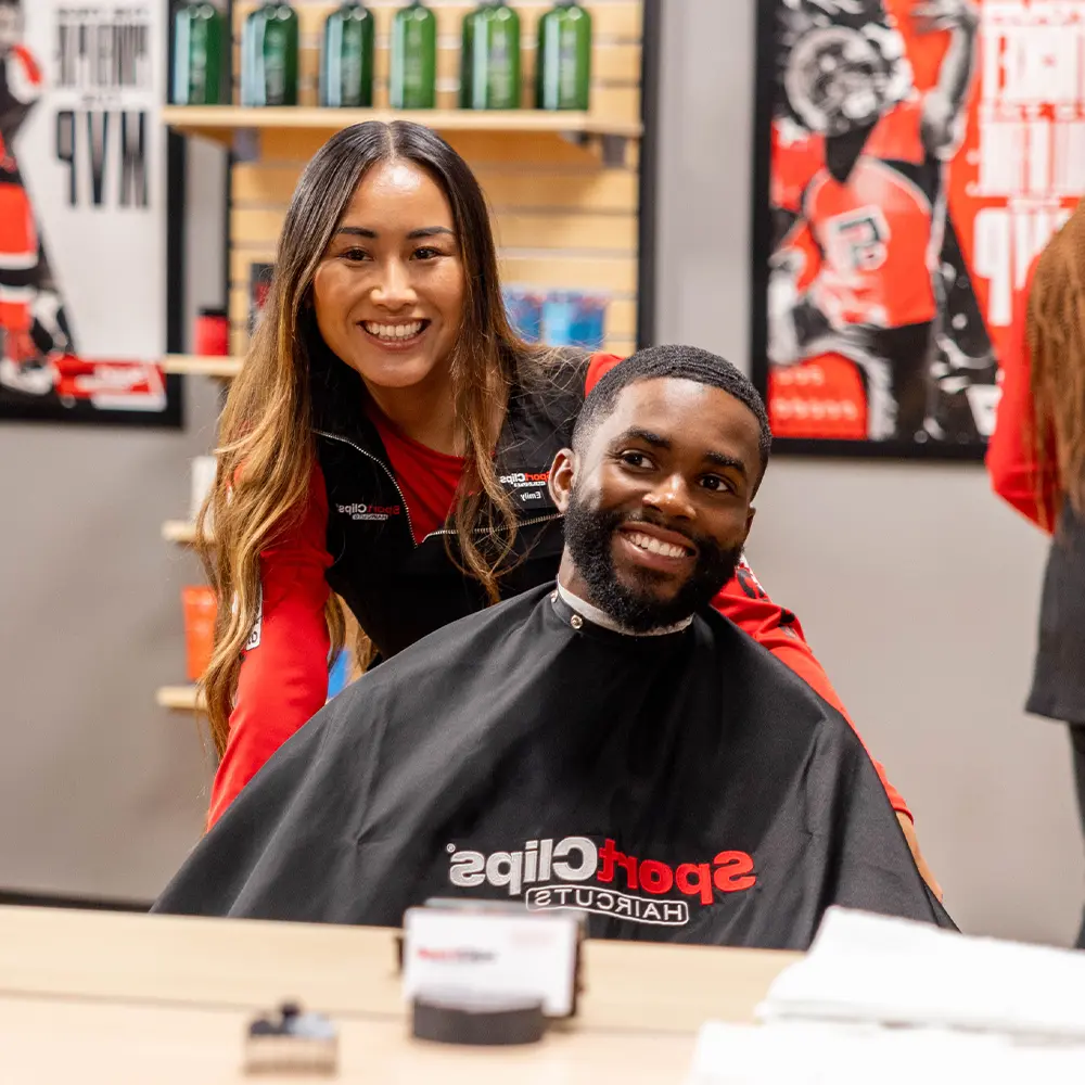 Man satisfied with his haircut