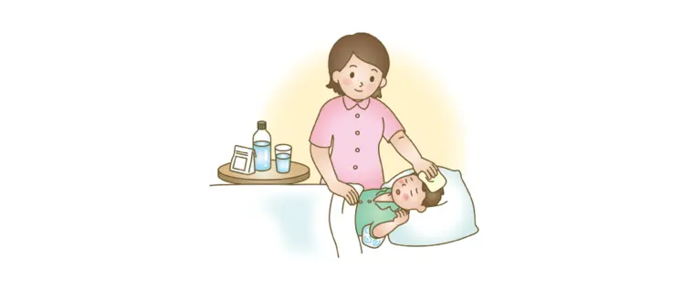 子どもを看病する母親