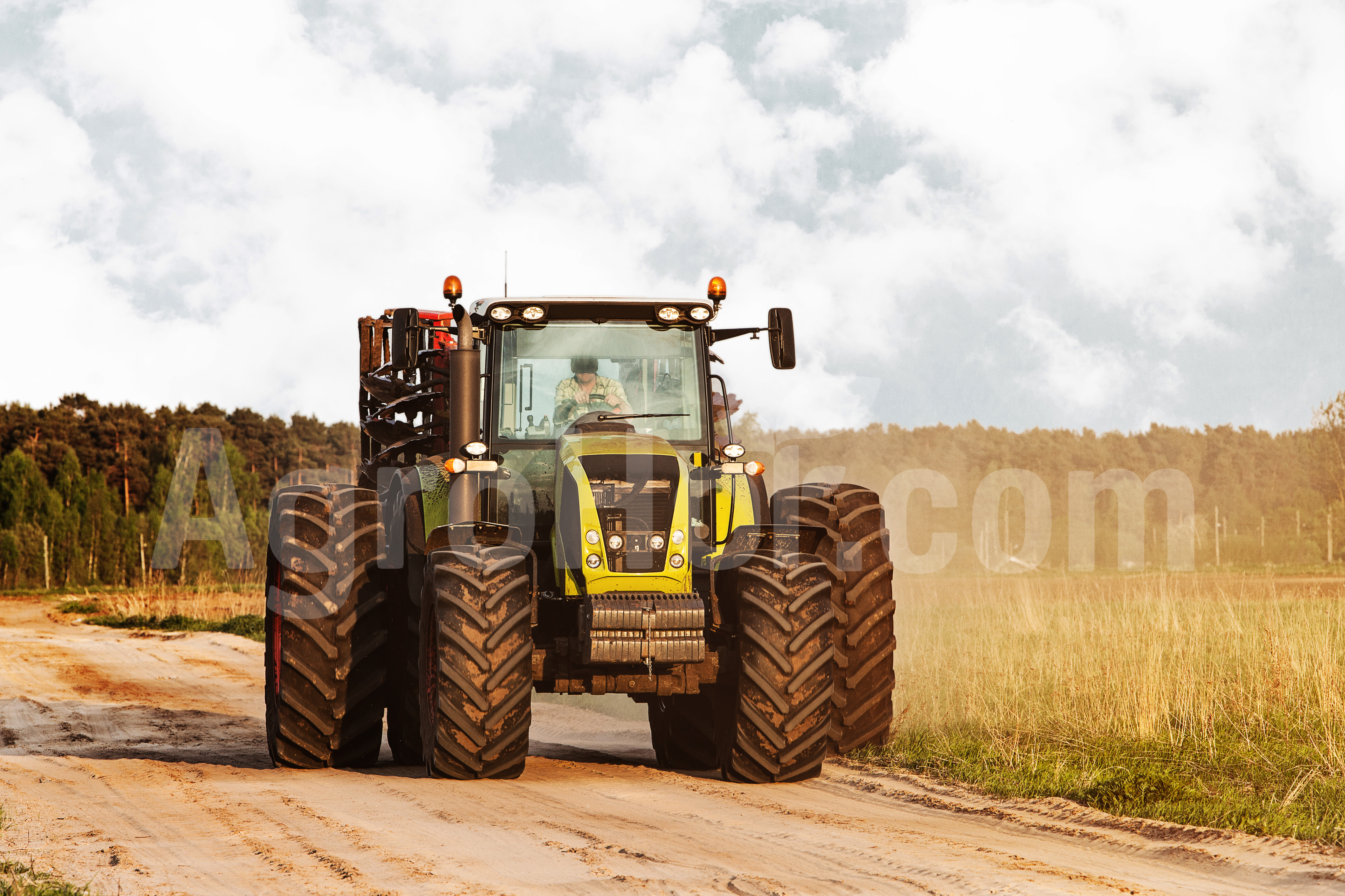 How  farmers should drive tractors in the traffic!