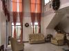 Living area with very nice Cathedral Ceiling and granite Flooring 