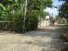 road going out of the small village.at the end is an asphalt national road, going either to LUCAP , Alaminos City Nat'l. high School and also going to town proper.