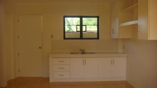 Kitchen with sink and cabinets