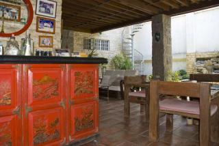 Large covered patio with bar